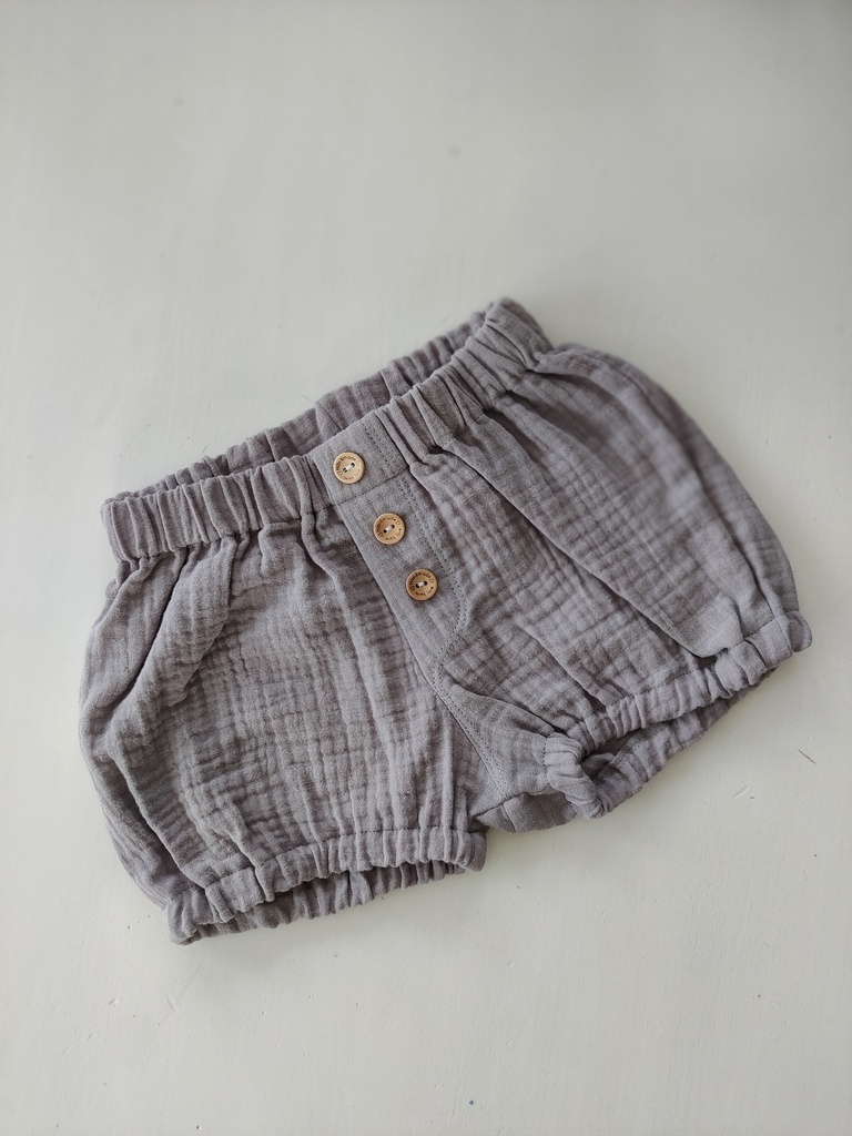 Romper med juksegylf og knapper.