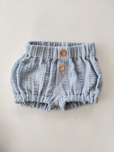 Romper med juksegylf og knapper.